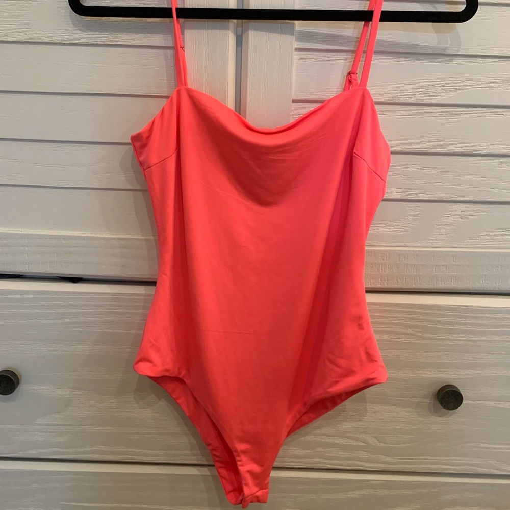 Neon pink bodysuit